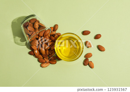 Skin care and body care concept - almonds, almond oil Skin care and body care concept - almonds, almond oil 123931567