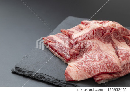 Raw beef on a black background Raw beef on a black background 123932431