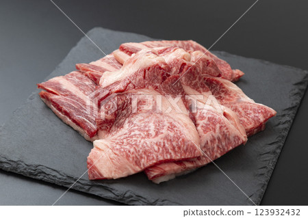 Raw beef on a black background Raw beef on a black background 123932432