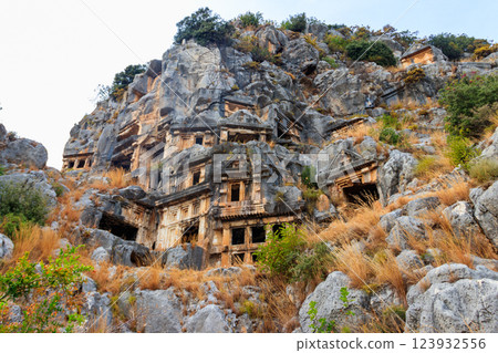 Rock-cut tombs of Lycian necropolis of the ancient city of Myra in Demre, Antalya province in Turkey Rock-cut tombs of Lycian necropolis of the ancient city of Myra in Demre, Antalya province in Turkey 123932556