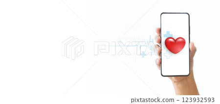A hand holding a smartphone with a red heart and a medical heartbeat line on the screen, symbolizing health and love. Digital health concept. Mobile health technology for healthcare applications. A hand holding a smartphone with a red heart and a medical heartbeat line on the screen, symbolizing health and love. Digital health concept. Mobile health technology for healthcare applications. 123932593