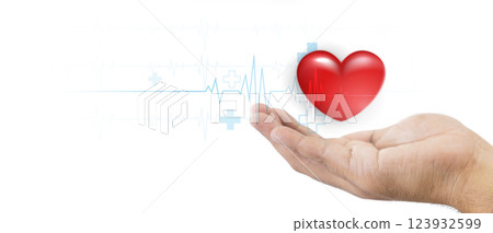 A hand gently holding a red heart, symbolizing care and love, with a medical heartbeat line in the background and symbolizing health and love. Showing the connection between love and healthcare. 123932599