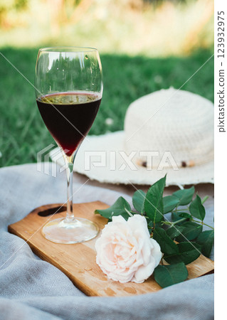Romantic picnic on a green lawn Romantic picnic on a green lawn 123932975