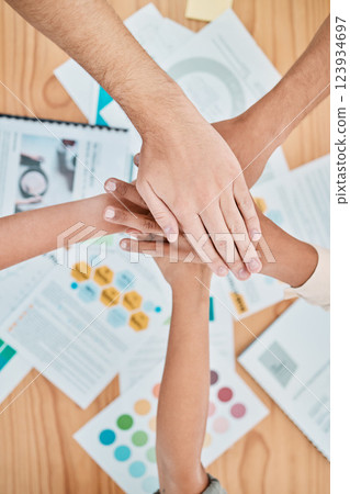 Hands, together and teamwork with diversity, business people, support and trust, working as a team and business meeting, planning strategy with paperwork and data. Group, collaboration and solidarity 123934697