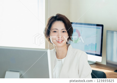Businesswoman working with digital transformation tools Businesswoman working with digital transformation tools 123935825