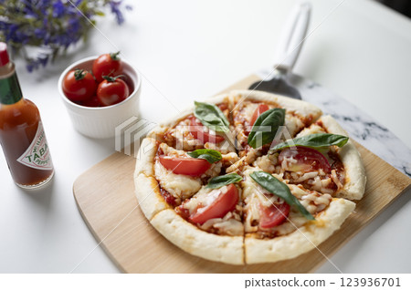 Margherita pizza cut Margherita pizza cut 123936701