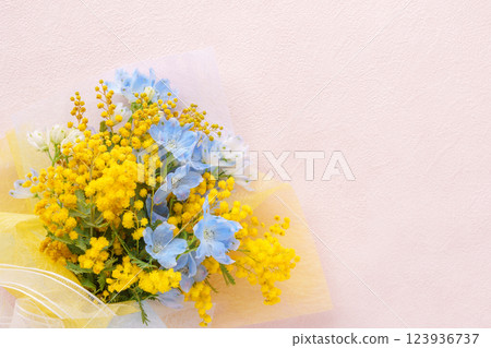 Mimosa and delphinium bouquet Mimosa and delphinium bouquet 123936737