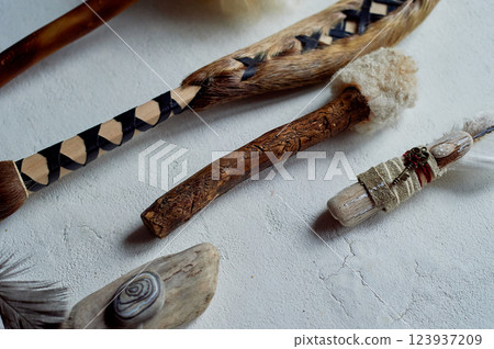 Shamanic objects. Tambourine beaters, a speaker's stick, noise makers. Ethnic Items. Shamanic objects. Tambourine beaters, a speaker's stick, noise makers. Ethnic Items. 123937209