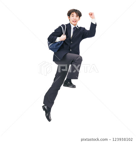 A male student in uniform jumping. A transparent full-body photo PNG precisely cut by hand 123938102