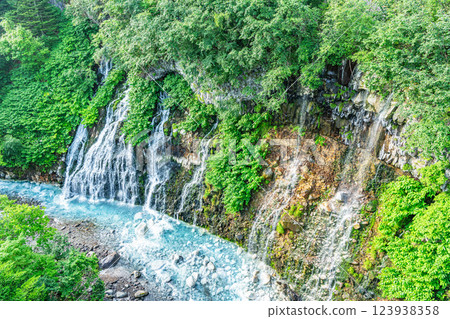 Biei Town, Hokkaido - One of Hokkaido's leading tourist attractions - Shirahige Falls in summer Biei Town, Hokkaido - One of Hokkaido's leading tourist attractions - Shirahige Falls in summer 123938358