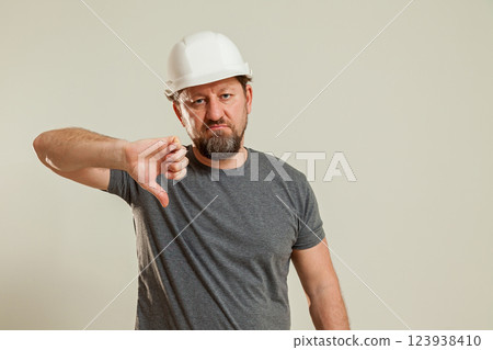 The guy shows different gestures with his hands 123938410