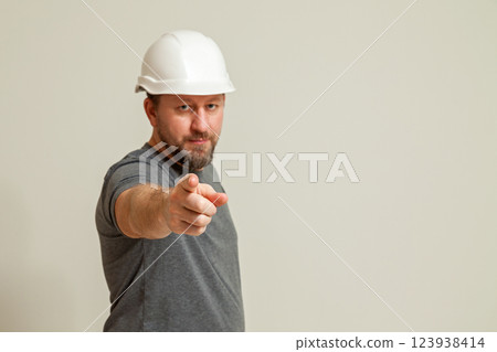 The guy shows different gestures with his hands 123938414