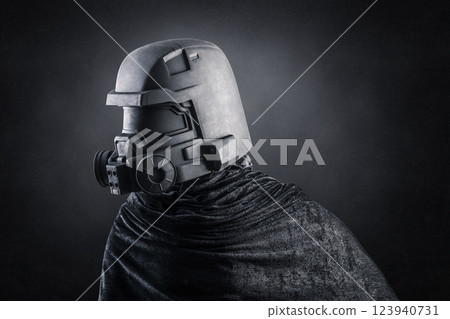 Man with helmet over dark misty background 123940731
