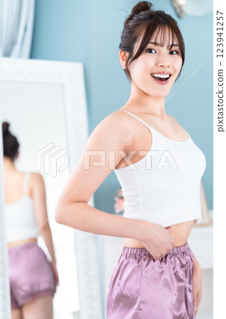 Slim woman working on improving her health Slim woman working on improving her health 123941257