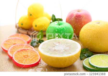Image of fresh fruit with water droplets (Tosa Buntan, apple, mandarin orange, lemon) 123941369