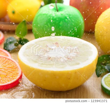 Image of fresh fruit with water droplets (Tosa Buntan, apple, mandarin orange, lemon) Image of fresh fruit with water droplets (Tosa Buntan, apple, mandarin orange, lemon) 123941371