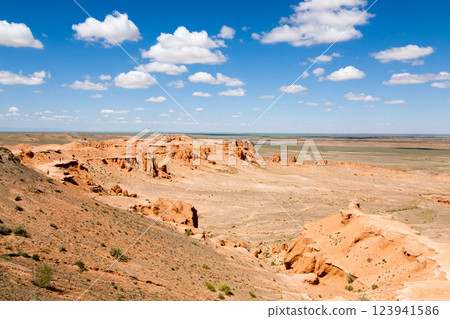 Flaming Cliffs rocks landscape, Mongolia. Gobi desert Flaming Cliffs rocks landscape, Mongolia. Gobi desert 123941586