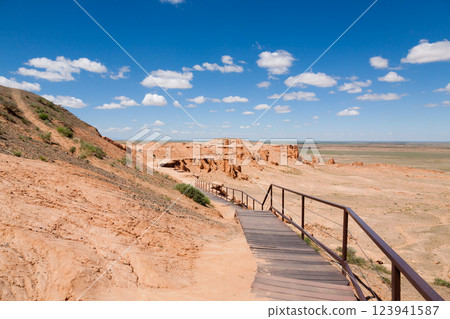 Flaming Cliffs rocks landscape, Mongolia. Gobi desert Flaming Cliffs rocks landscape, Mongolia. Gobi desert 123941587