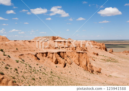 Flaming Cliffs rocks landscape, Mongolia. Gobi desert Flaming Cliffs rocks landscape, Mongolia. Gobi desert 123941588