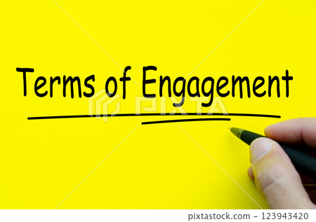 Terms of Engagement text on yellow notepad. Agreement concept Terms of Engagement text on yellow notepad. Agreement concept 123943420