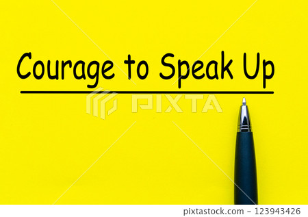 Courage to speak up text on yellow notepad. Speak up culture 123943426