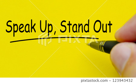 Speak up and stand out text on yellow cover background. 123943432