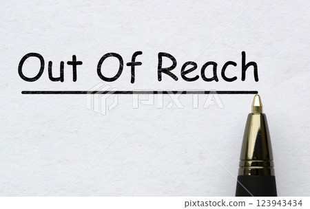 Out of reach text on white paper. Out of office concept 123943434