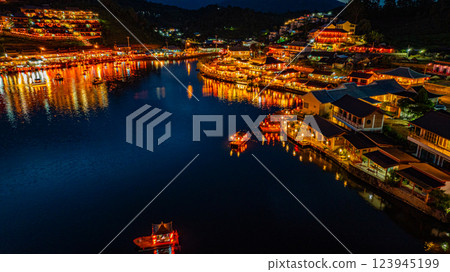 Illuminated Chinese Mountain Village at Night Illuminated Chinese Mountain Village at Night 123945199