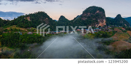 Aerial view of stunning sunrise above a small village Aerial view of stunning sunrise above a small village 123945200