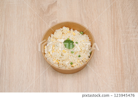 Simple Cantonese rice Cantonese shrimp rice in paper takeout container Simple Cantonese rice Cantonese shrimp rice in paper takeout container 123945476