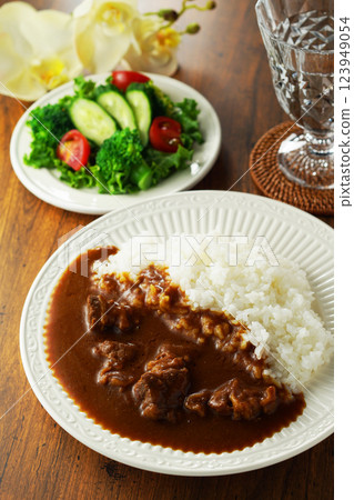 Beef curry and green salad Beef curry and green salad 123949054