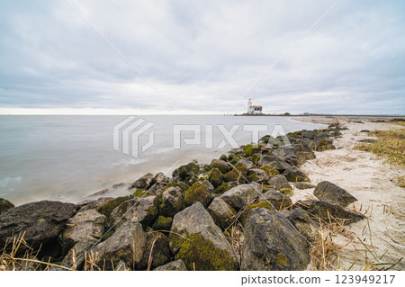 lighthouse on a cloudy day lighthouse on a cloudy day 123949217