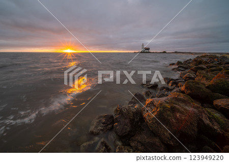 lighthouse on a cloudy day 123949220