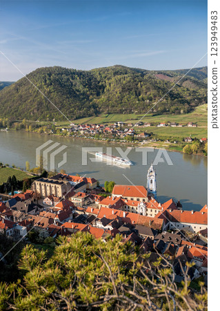 Durnstein village with ship on Danube river during spring time in Wachau, Austria 123949483