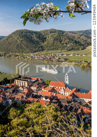 Durnstein village with ship on Danube river during spring time in Wachau, Austria 123949484