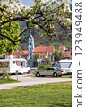Durnstein village with church against camping area next to the Danube river during spring time in Wachau, Austria 123949488