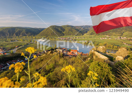 Durnstein village with Austrian flag during spring time in Wachau, Austria Durnstein village with Austrian flag during spring time in Wachau, Austria 123949490