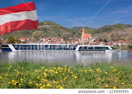 Durnstein village with Austrian flag during spring time in Wachau, Austria 123949491