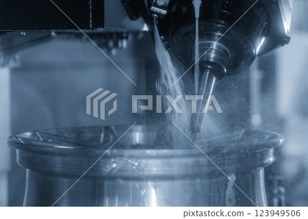 The 5-axis CNC milling machine  cutting the magnesium alloy wheel part with solid ball end mill tool. 123949506