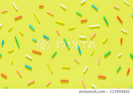 pattern of colorful sprinkles with hard shadow  123949982