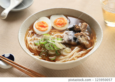 Delicious udon noodles topped with boiled mackerel 123950057