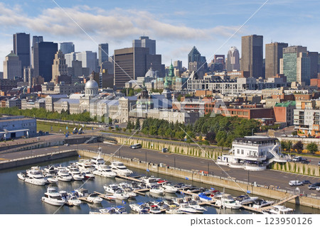 Aerial view of Montreal skyline in summer with yachts port in the foreground 123950126