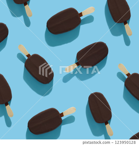 trendy seamless pattern of chocolate popsicle with ice cream and hard shadow on blue background, creative decoration of summer concept trendy seamless pattern of chocolate popsicle with ice cream and hard shadow on blue background, creative decoration of summer concept 123950128