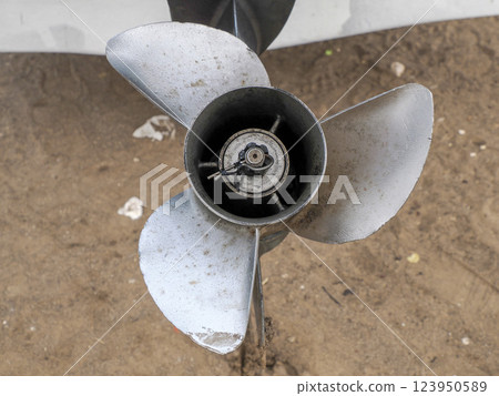 small boat engine propeller detail 123950589