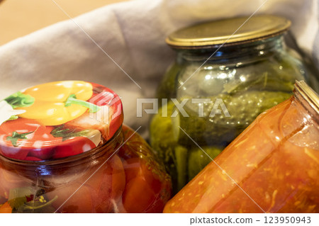 Jars with different types of pickles and preserves 123950943