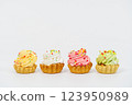 Four cream cakes. White background. 123950989