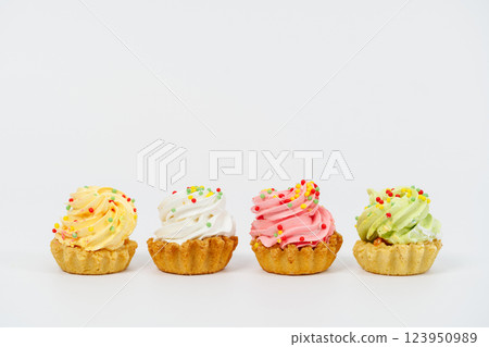 Four cream cakes. White background. Four cream cakes. White background. 123950989