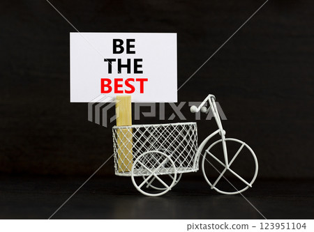 Motivational be the best symbol. Concept words Be the best on beautiful white paper on clothespin. Beautiful black background. Miniature bicycle. Business motivational be the best concept. Copy space Motivational be the best symbol. Concept words Be the best on beautiful white paper on clothespin. Beautiful black background. Miniature bicycle. Business motivational be the best concept. Copy space 123951104