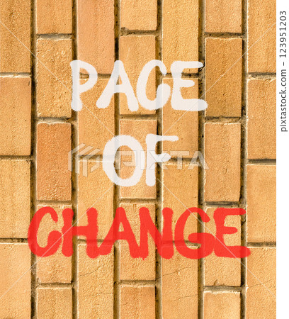 Pace of change symbol. Concept words Pace of change on beautiful brown brick wall. Beautiful brown brick wall background. Business pace of change concept. Copy space. Pace of change symbol. Concept words Pace of change on beautiful brown brick wall. Beautiful brown brick wall background. Business pace of change concept. Copy space. 123951203