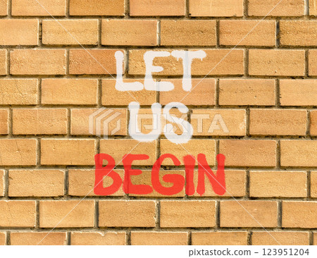 Let us begin symbol. Concept words Let us begin on beautiful brown brick wall. Beautiful brown brick wall background. Business motivational let us begin concept. Copy space. Let us begin symbol. Concept words Let us begin on beautiful brown brick wall. Beautiful brown brick wall background. Business motivational let us begin concept. Copy space. 123951204